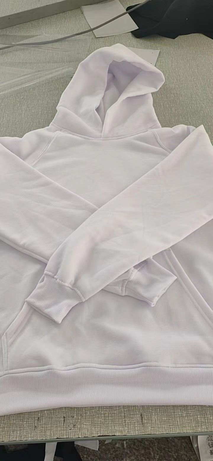 1977 hoodie styles in white, showcasing vintage streetwear pullover design and comfortable fit.