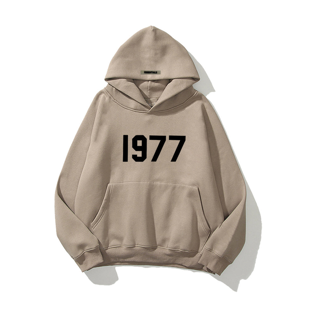 1977 hoodie styles in beige, featuring a classic design with 1977 graphic for vintage streetwear comfort.